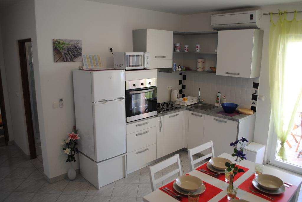 Apartments Vidolma Povljana Bagian luar foto